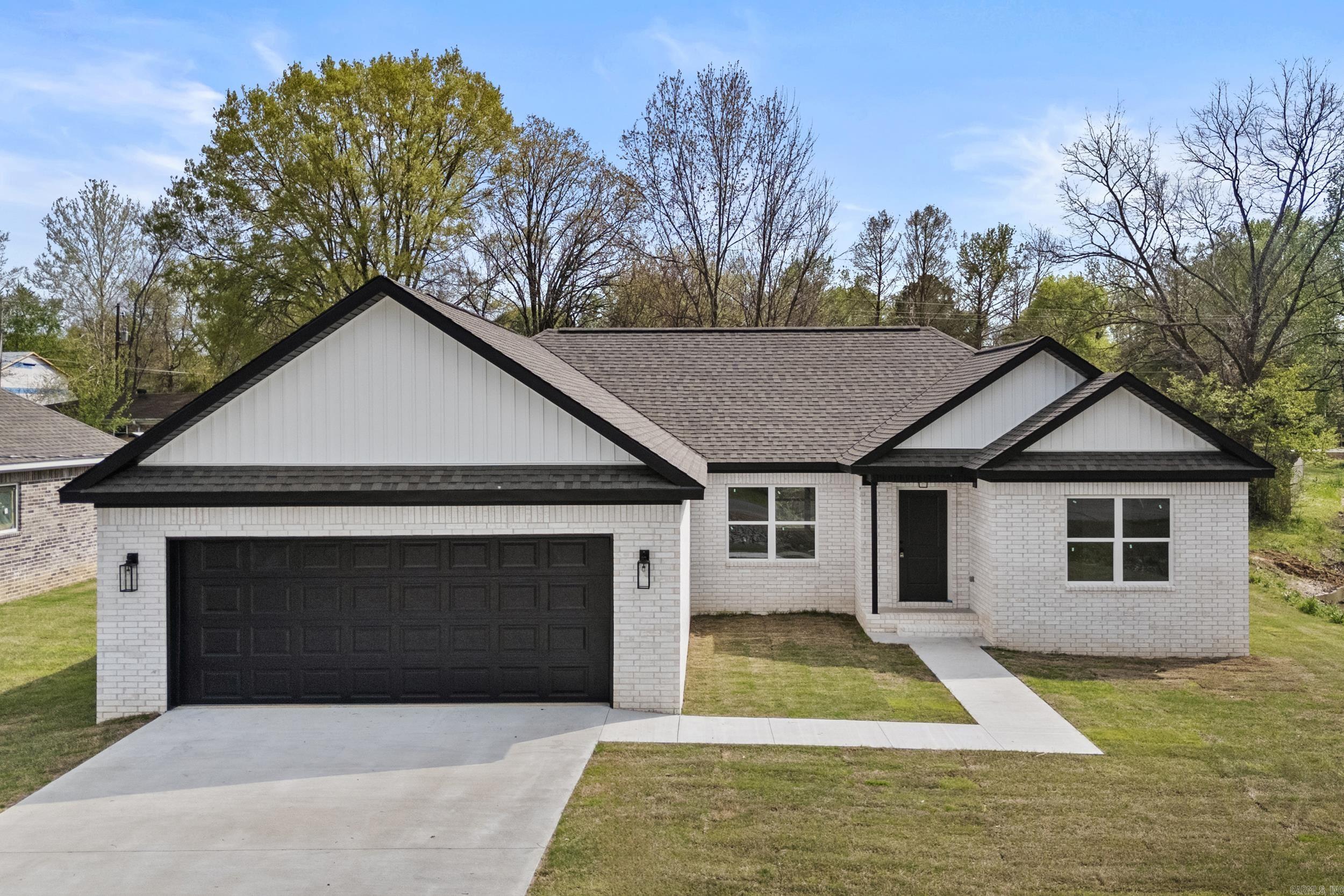 Construction to be complete within 30days. Beautiful all brick new construction on an oversized lot. Minutes from everything. LVP in the living room and the bedrooms. Tile in the wet areas. Quartz countertops throughout. All cabinets and shelving are custom site built. All electric for easy maintenance. Area is approved for Rural Development $0 down loans.