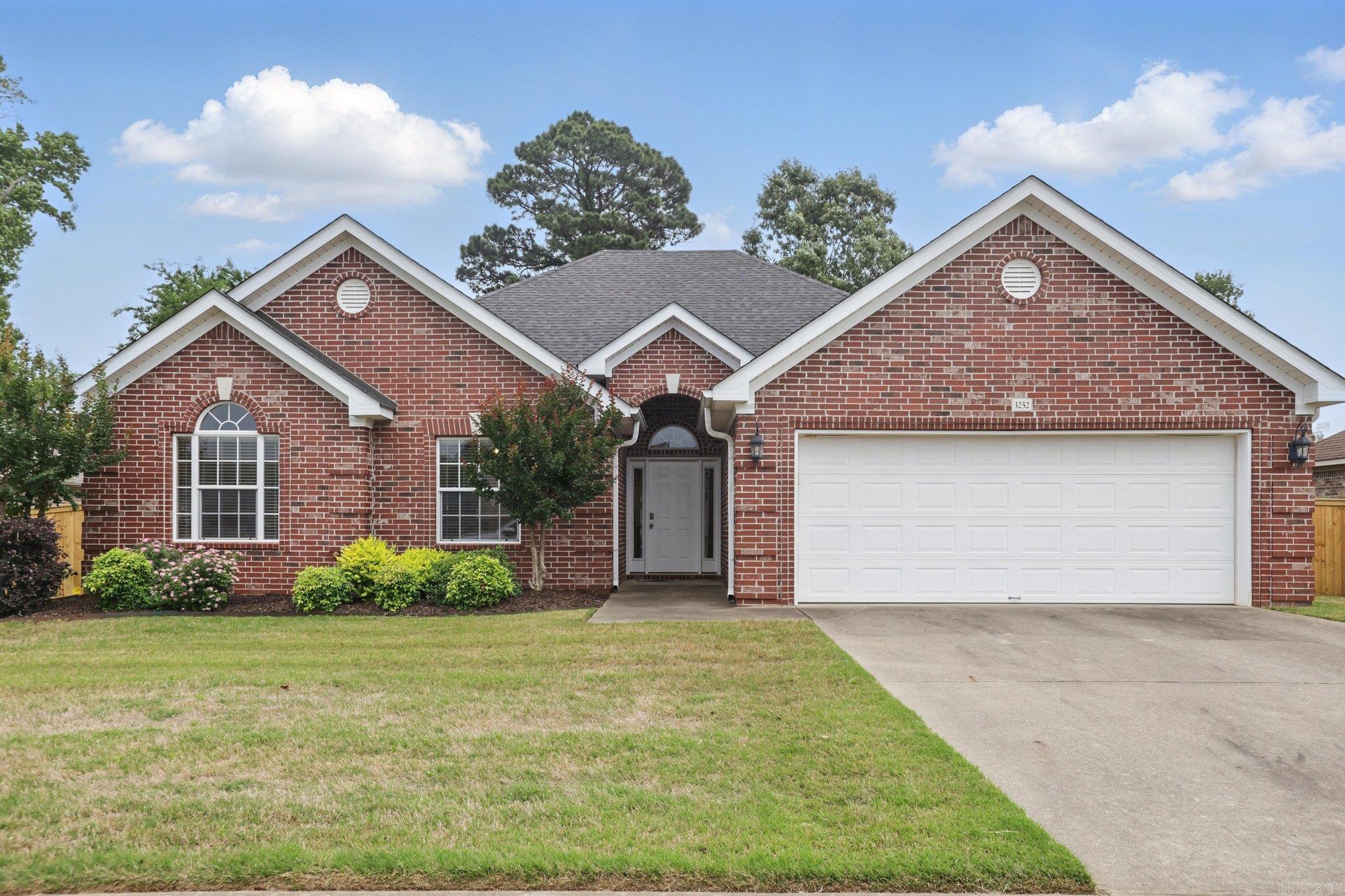 Welcome to 3252 Clover Hill Ln.! Conveniently located in Heritage Farm subdivision! This beautiful home boasts a charming Living Area with fireplace, a large Sunroom/Formal Dining Room, and large fenced-in Backyard creating an inviting atmosphere. This home consists of 4 Bedrooms, one bedroom doubling as a home office with custom built-in Bookshelves (2016). Large Primary Suite and Primary Bath, with an added Jacuzzi Tub for additional relaxation. Hardwood floors in main Living Areas and Bedrooms. Roof and Deck replaced in 2019. Freshly painted and well maintained! This property also offers a built-in Sprinkler System (2016). This subdivision also offers a Community Pool and Playground, perfect for families to enjoy.