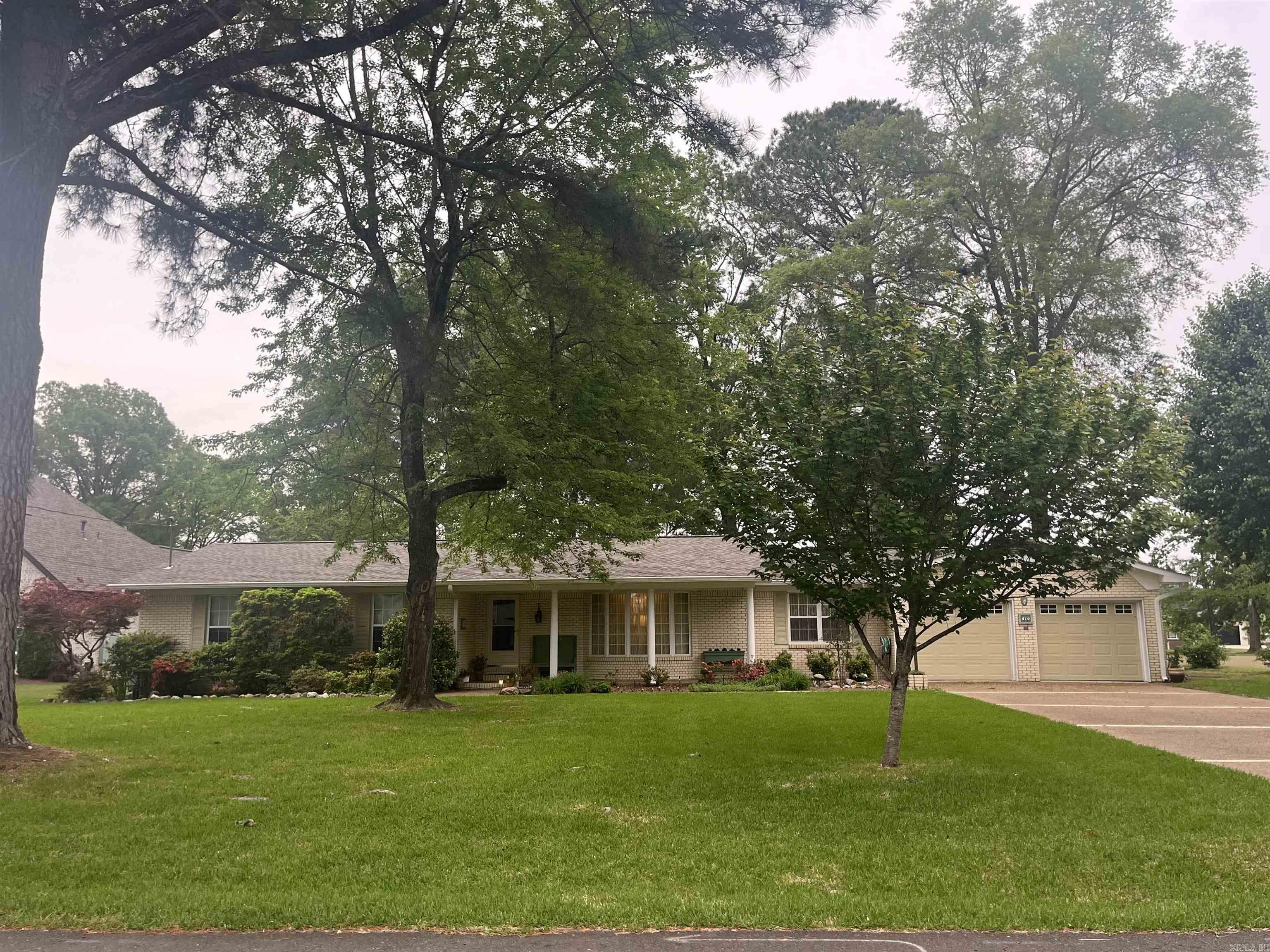 Lovely 3 Bedroom 2 Bath Lakefront Home in the Much Sought After Caroline Acres Subdivision.There is a formal living room and dining room as well as an eat in kitchen with beautiful lake views. The cozy den features a wood burning fireplace . The large screened in porch is the perfect place to enjoy your morning coffee. There is also a single stall boat dock.