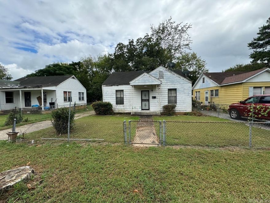 GREAT INVESTMENT POTENTIAL. Nearby homes are newly renovated and bringing such great promise. This property is awaiting the right investor. Property was previously rented and is being sold AS IS.