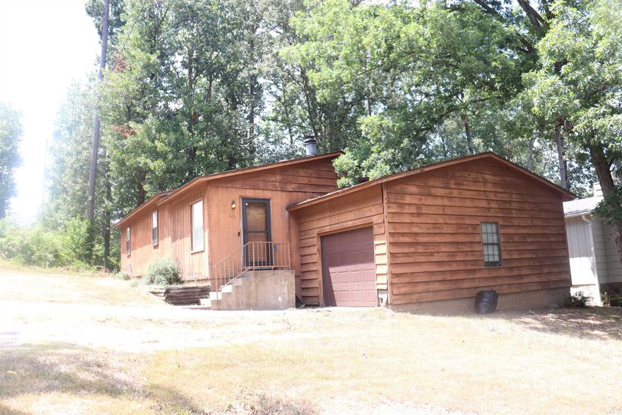 Fantastic house with LOTS of upside potential. Interior freshly painted. Cozy den with fireplace. Plenty of room and storage in the kitchen. Roomy bedrooms. This is a home you can life in and fix up as you go. Close to shopping, restaurants, and entertainment. Sq. ft. approx. Measuring encouraged.