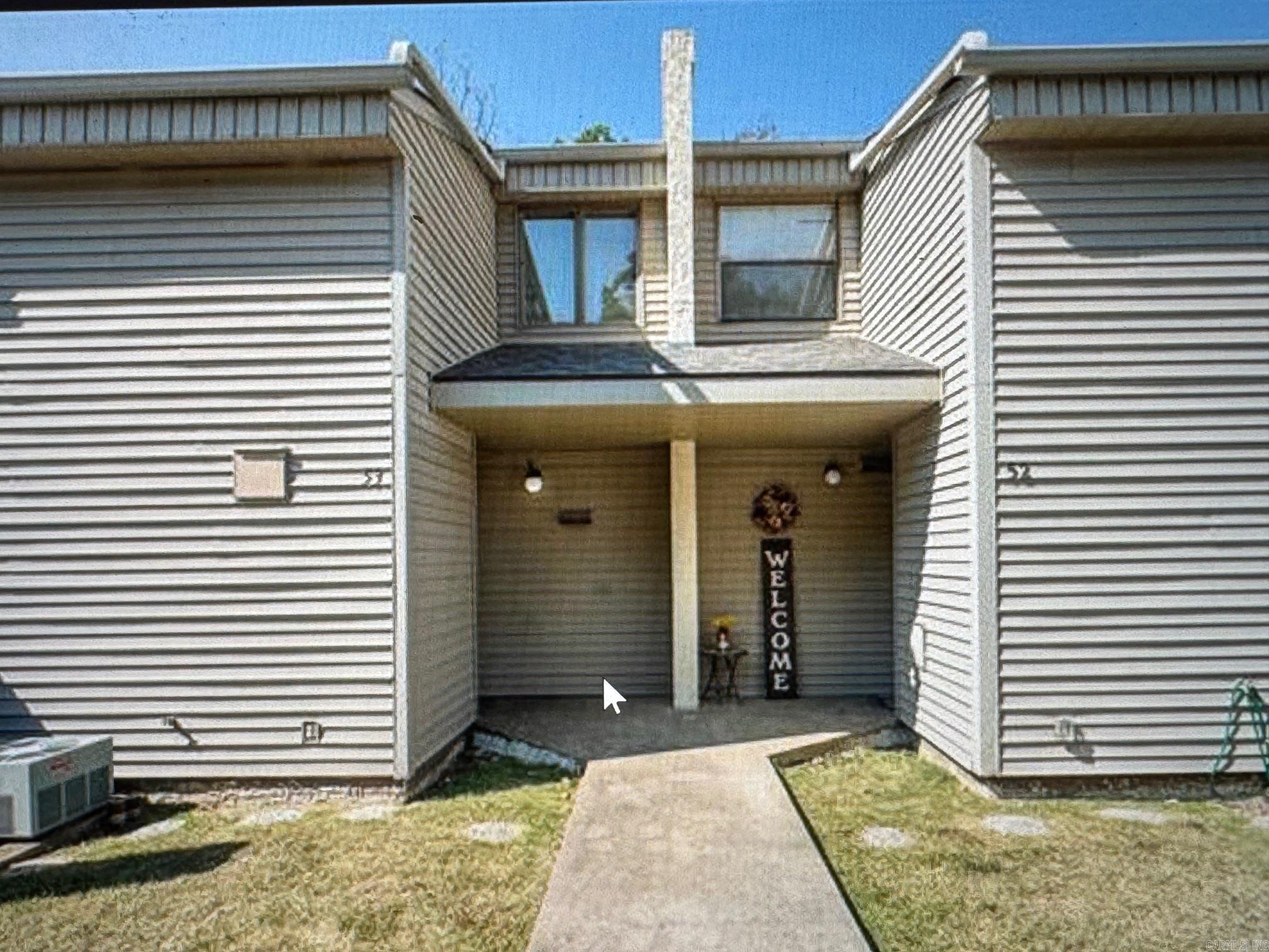 Welcome to Lakewood Hills unit 53, this unit offers the best in lake area living. Enjoy the private pool for Lakewood Hills owners only or experience the many other pools and recreation that comes with being a property owner in Fairfield Bay. This unit comes partially furnished and has had sever updates including tile floors, new hard wood stair treads, and new paint in several rooms. The two generous sized bedrooms will accommodate a variety of sleeping situations. The outdoor patio looks out onto a wooded lot to enjoy some privacy when enjoying outdoor living. Don't let this gem get away.