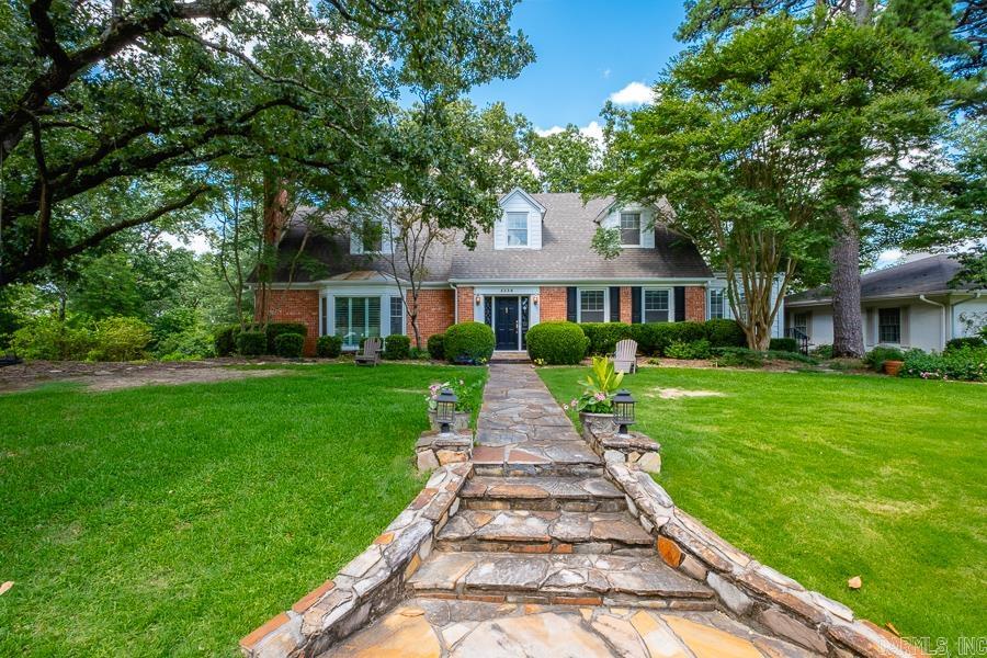 Handsome traditional home has 9 ft ceilings; Hardwood floors on main and up; Oversized den with fireplace. Large screened porch with ceiling heaters. Guest bedroom on main level and 2 up. Well appointed kitchen which opens into delightful sun room. Bedroom & bonus room at basement level not included in square footage. Lovely landscaped rear yard. Wet bar has ice maker and wine fridge.