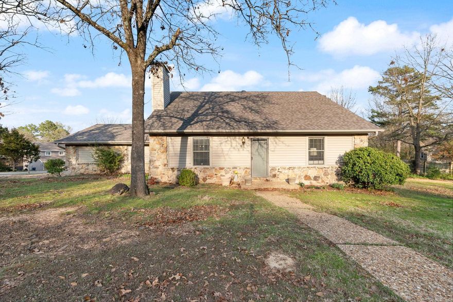 Spacious home on a corner lot conveniently located. Primary bedroom downstairs with 2 guest bedrooms and a full bath upstairs. Kitchen has a big island with seating  and a pantry. Plenty of cabinets for storage. Large side yard. New Roof 2023  Agents see remarks