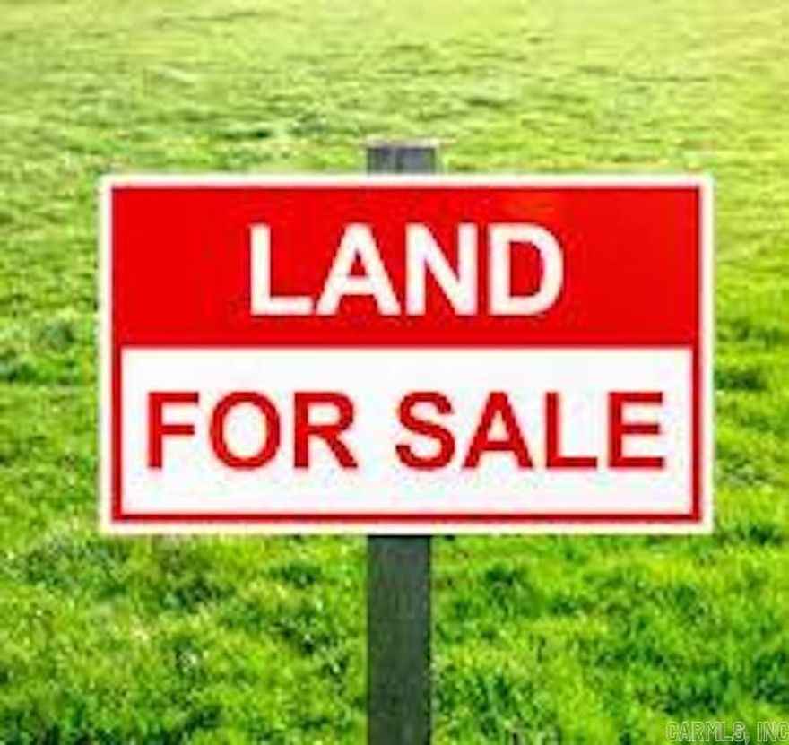 Almost 7 acres, perfect for country living!  There are no restrictions for this property!  Land is full of hardwoods and pines!  Mobile homes allowed!