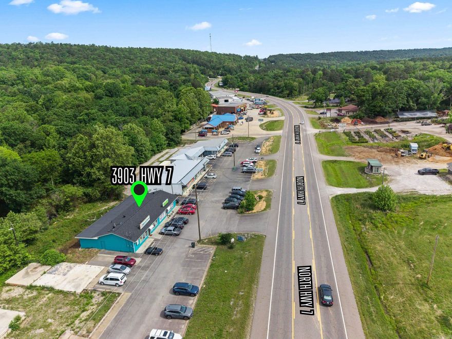 EXCEPTIONAL INVESTMENT OPPORTUNITY!!  ON THE HIGHWAY!! HIGH VISIBILITY! HIGH TRAFFIC COUNT!  Building & Land with 2 Storefronts just a few miles South of the Hot Springs Village West Gate Entrance and a few miles North of the Hot Springs Village Walmart! Both current tenants/businesses have been at this location for over 7 years and would like to stay!  Current leases include a very successful nail salon and a very successful senior-living service business. Their rents total $3000 per month!  There is presently additional un-rented office space with $600 monthly rental potential. Current leases and potential leases combine for a total potential of $43,000 in annual leases!  DON’T MISS THIS INCREDIBLE OPPORTUNITY!!  CALL ME TO SCHEDULE YOUR SHOWING!