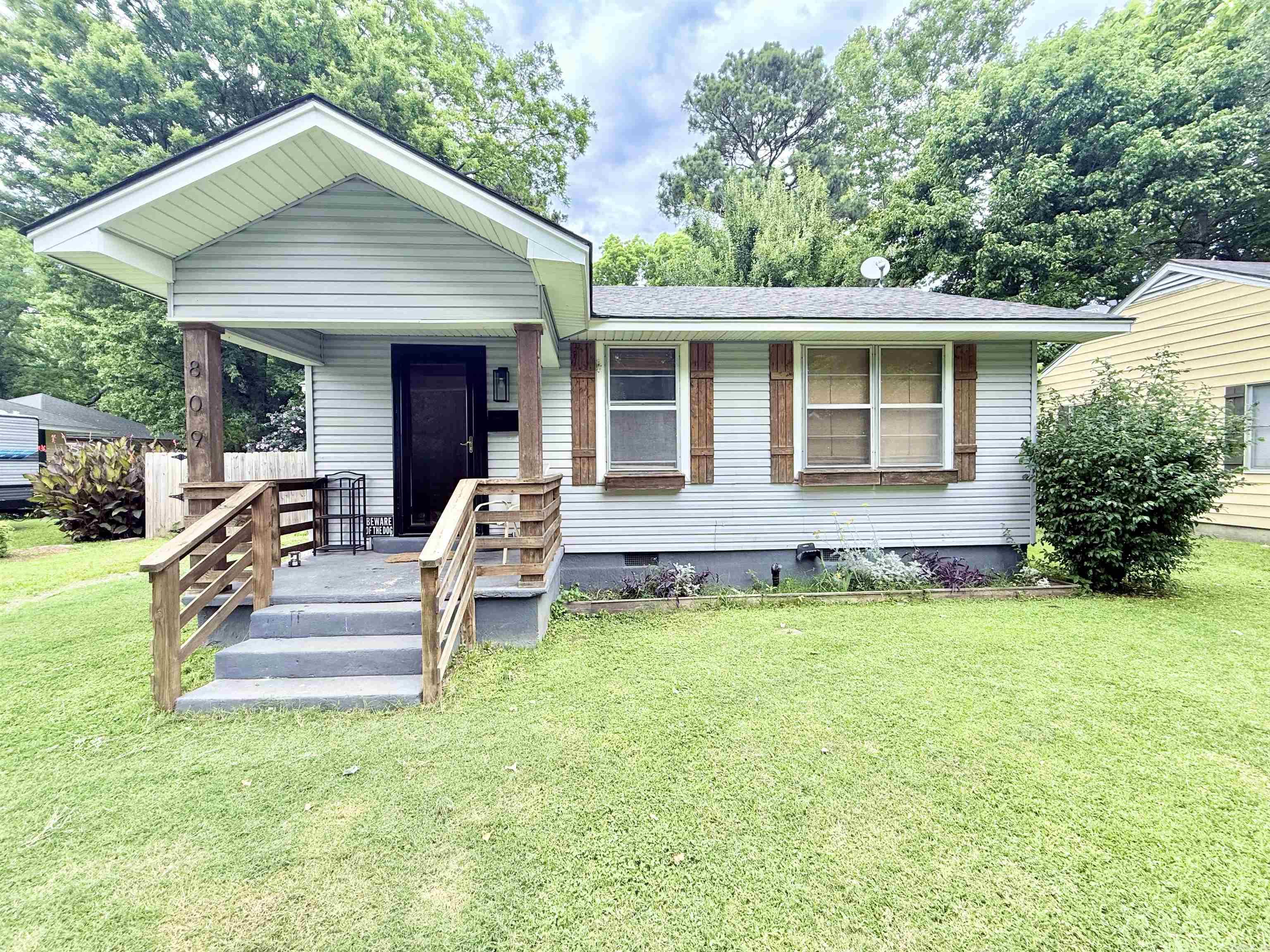 Step inside this beautifully refreshed two bedroom gem in the heart of England, Arkansas! From the moment you walk up to the cozy front porch with wood accents, you'll feel right at home. Inside, enjoy trendy touches like wood accent ceilings updated vinyl flooring and modern black and white bathroom that brings big city vibes to small town living. The eaten kitchen boasts sleek black cabinets but butcher block accents and a bright dining nook. Needs space? You've got it, with a fully fenced backyard, covered parking for two and a detached shop/storage area with an air unit and electricity. Plus you're just minutes from schools, shopping, and highway 165.