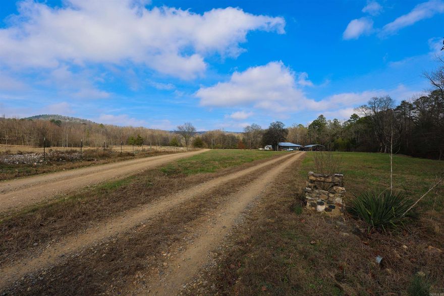 Escape to your own slice of Arkansas paradise with this beautiful rural property featuring a charming home surrounded by breathtaking mountain views. A peaceful creek meanders through the land, creating a serene setting perfect for relaxing, or simply enjoying the sounds of nature. Ideally located near the Caddo River and the scenic Little Missouri Falls, this property offers endless opportunities for outdoor adventure, including fishing, swimming and hiking. The nearby Albert Pike Recreation Area and thousands of acres of National Forest provide exceptional access to trails, wildlife, and unspoiled natural beauty.Whether you’re seeking a private retreat, a full-time residence, or a weekend getaway, this property delivers the perfect balance of seclusion and accessibility.