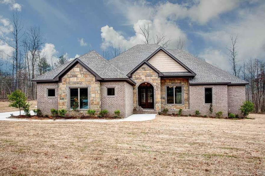 If you are looking for high quality new construction with a country setting, then look no further.  Gated neighborhood, split floor plan with 4 bedrooms and an office.  Open kitchen with custom faux painted cabinets and premier granite.  Hand scraped hardwoods in formal dining and living areas.  Beautiful backyard to watch deer from your covered back porch.