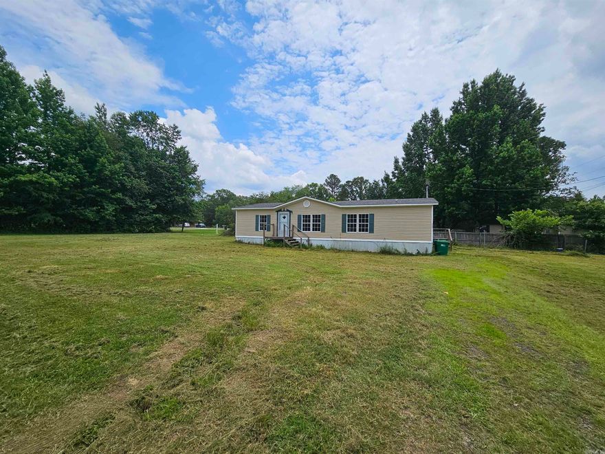 If you are looking for a nice home or an investment property, here is one for you. This double-wide mobile home has a lot to offer. The home has been used as a rental property for the last few years and requires some TLC. The owner has never lived at the property and no property disclosure is available. There is no utilities on and it will be the buyer's responsibility to turn them on if needed. The property is sold as is, with no repairs to be made by the seller. If home inspection is done is for informational purposes only. The seller's agent see remarks