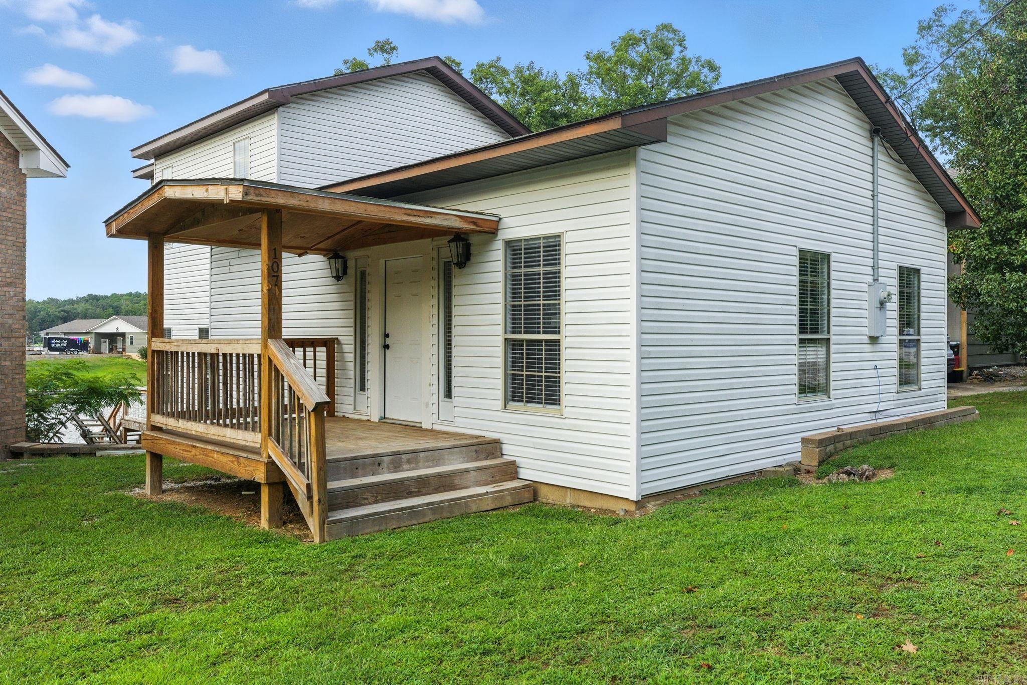 Welcome to beautiful Lake Hamilton. Discover the charm of lakefront living with this inviting 2-bedroom, 2-bath tri-level cottage. This home blends comfort, character, and direct access to the waterāmaking it an ideal year-round residence, weekend escape, or investment retreat. The cottage offers a cozy yet versatile floor plan, and provides warm living spaces and picture-perfect views that inspire relaxation at every turn. Step out on your private deck and enjoy your own private piece of shorelineāideal for morning coffee, casting a line, or gathering with friends as the sun sets across the lake. Whether youāre looking for a peaceful retreat, a weekend escape, or a charming full-time residence, this cottage balances comfort, character, and convenience. Just minutes from Hot Springs dining, shopping, and recreation, this property combines the tranquility of the lake with easy access to all the area has to offer. Lakefront opportunities at this price point are rareādonāt miss the chance to make it yours.