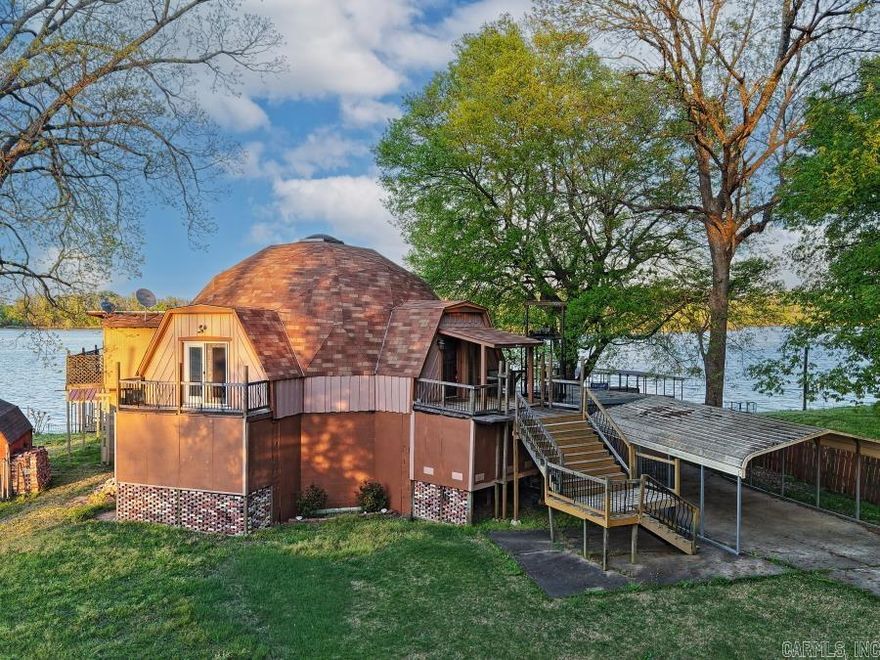 Wake up to stunning water views in this beautiful riverfront retreat! This 2-bedroom, 2.5-bath home offers the perfect blend of comfort and outdoor living. A bright bonus sunroom provides flexible space that can easily serve as a third bedroom, office, or relaxing lounge area.  Step outside to a spacious deck overlooking the water—ideal for entertaining, morning coffee, or evening sunsets. Enjoy direct river access with your own private boat dock featuring an electric lift, making days on the water effortless.  The property also includes a convenient storage shed for tools, gear, or recreational equipment. Whether you're looking for a full-time residence, weekend getaway, or investment opportunity, this home delivers the ultimate waterfront lifestyle.