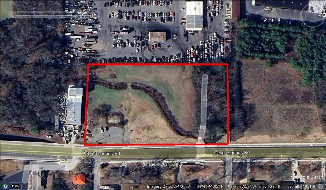 Large industrial lot off of Geyer Springs Road. Majority flat buildable lot. High visibility off of Geyer Springs. Highway access is nearby.