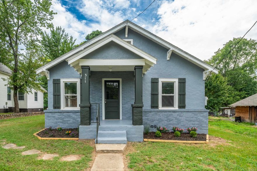 Step into this beautifully updated 1940s cottage, blending historic charm with modern convenience. Nestled near Oaklawn, it offers character and contemporary living.  Spacious Living Areas: Original hardwood floors in the living room, dining room, and bedrooms add timeless warmth.  Modern Kitchen: Features a gas stove, dishwasher, fridge, epoxy countertops, and a stylish tile backsplash—ideal for home chefs.  Updated Bathroom: Fresh vanity, lighting, and a tile-surround bathtub create a spa-like feel, with vintage-inspired tile flooring.  Thoughtful Details: Original molding preserves charm, while updated tile in the kitchen and bath adds modernity.  Convenient Laundry: Separate laundry room off the master bedroom.  Exterior & Parking: Wooden garage (new HVAC 2025, roof 2024) and easy side parking.  Location: Steps to downtown, Oaklawn, shopping, and hospital. A rare find—don’t miss it!