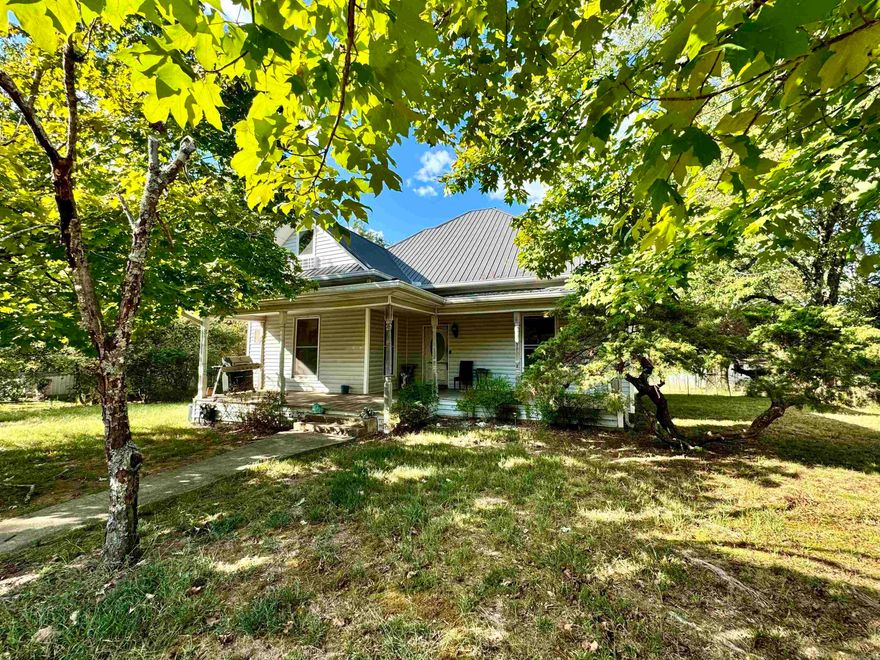 One of the original Glenwood homes that was built for the managers of the newly developed sawmill.  Character exudes throughout.  Built in 1906, this home is one of 6 similar homes all built around the same time.  Upon entry you are met with high ceilings that extend into the living, dining, kitchen and bedrooms.  The home does have 2 updated bathrooms on the main level and an updated kitchen.  The wood burning fireplace is functional.  Additional space has been added to the second floor that could be additional bedrooms and just needs some finishing touches.  Plumbing is in place for a separate bathroom upstairs.  The additional space is heated and cooled. The enclosed sunroom overlooks the oversized back yard that is fenced.  There is also a root cellar.