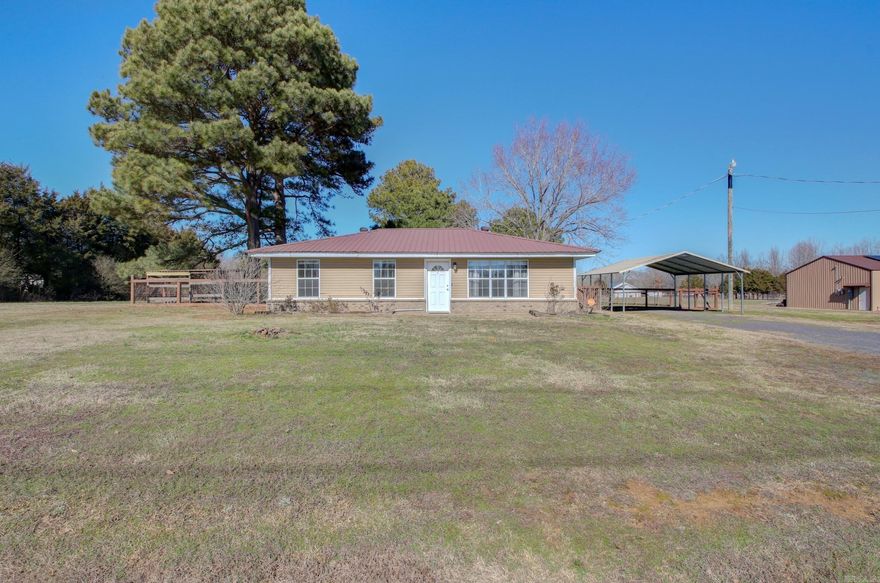 Embrace serene country living with this 3 bed, 2 bath home on around 4 acres to call your own. Fenced backyard and electrical fencing for animals! This home features a spacious 30x40 shop (16ft high!) with double bay garage, electricity, a loft, and wood burning heater stove. Nice walk in closet in primary. Green solar energy that is hooked up to shop and house will be paid off at closing! Come see this home today, your country oasis awaits! Metal roof installed 2019. Water heater 2019. AC unit 2020.