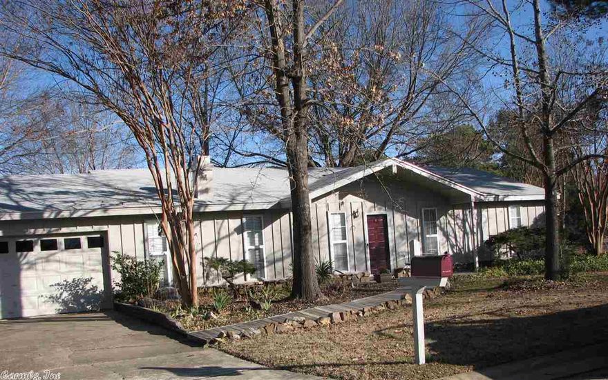 Awesome house on on a beautifully landscaped corner lot. Home has new roof Nov. 14, new paint interior and exterior, Tilt in windows, Most of the ceiling fans are newer. Fire place with a Buck Stove insert...Large Tile floors through out except for bedrooms. Sunroom with cathedral ceilings and a spa (hot tub) that conveys. Eat in kitchen, newer counter tops, all appliances convey. This house is move in ready!! You must see all the improvements and storage in this home.