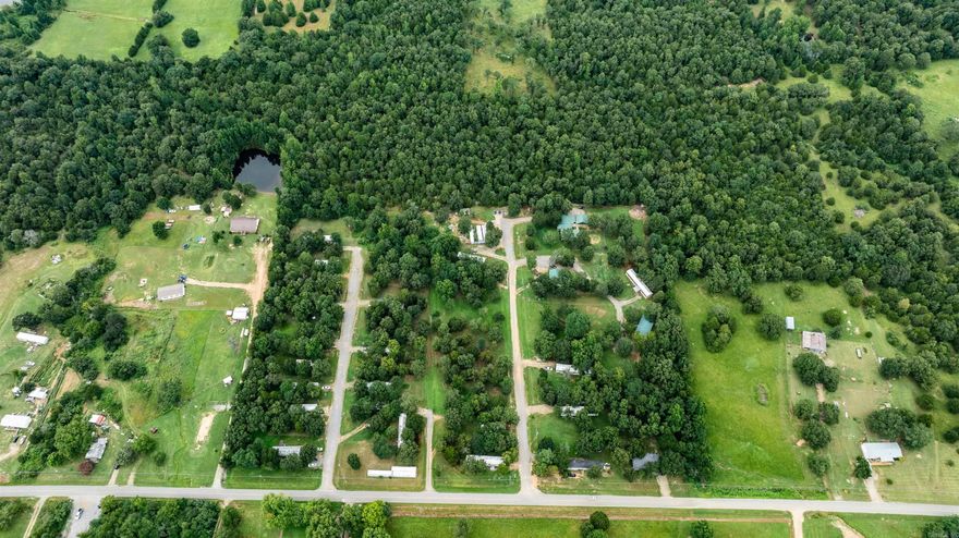 Mobile Home Park Investment Opportunity  Welcome to a prime investment opportunity with this 23-pad mobile home park, sprawling across a generous 15-acre lot. This park presents a golden chance to add significant value and growth potential. With ample space to expand and add more units, investors can capitalize on the increasing demand for affordable housing.  All homes in the park are park-owned, with tenants responsible for paying their own utilities, simplifying management and reducing overhead costs. Current rents offer room for adjustment to align with market rates, providing an immediate avenue for revenue enhancement. Additionally, operational expenses can be optimized, further increasing profitability.  The park features a blend of well-maintained lawns and shade trees, creating an attractive and comfortable living environment for tenants. Positioned away from the homes, these green spaces offer a serene retreat within the community.  Conveniently located close to shopping centers, entertainment venues, and commercial hubs, this mobile home park ensures easy access to essential amenities and leisure activities, making it a desirable location for residents. See Agent Remarks