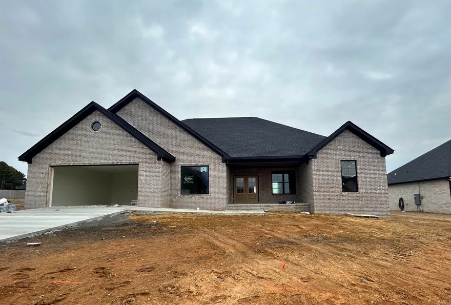 New Construction in Belmont Estates - Searcy, AR! This 4-bedroom, 2.5-bath home offers 2,474 sqft of timeless design with a fresh, modern edge. You’ll love the open split floor plan with LVP flooring throughout, a kitchen featuring a gas range, quartz countertops, and a spacious walk-in pantry — all flowing into a living area centered around a stunning floor-to-ceiling stone electric fireplace. The laundry room includes extra storage space, lockers that passes through to the owner suite side first starting with the closet, then bathroom that features a walk-in tile shower, soaker tub, double sinks, lighted mirrors boasting with natural lighting. Other features of the house include gas heat, gas tankless water heater to add extra efficiency to everyday living. Enjoy quiet evenings or weekend gatherings on the covered back patio! Reach out today for details or to schedule a private tour! 2 10 Year special builder warranty. Estimated completion date end of Feb 2026.