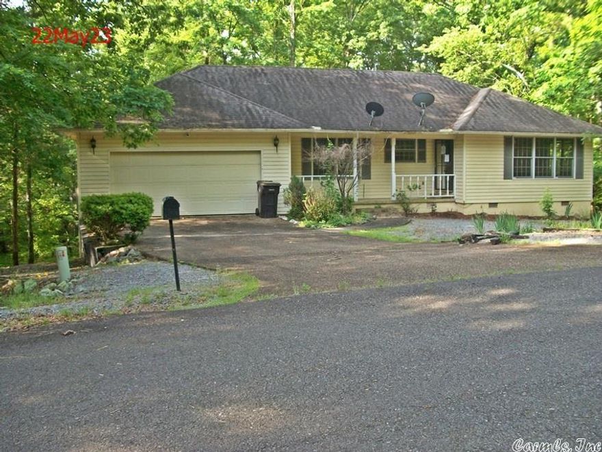 HOT SPRINGS VILLAGE.. 3BR 2 baths $149,900... wooded lot. quiet cul-de-sac w/circle drive...open floor plan, main BR on 1st floor, 2 BRs w/jack-n-jill bath D'stairs; lg wood deck for first floor & patio for lower level; oversized 2-car gar enters kit & all other rooms on 1st floor.. gd for retirees!! HSV offers living at its best with gated access, 24/7 security, 11 sparkling lakes, 7 pro golf courses, tennis cts & so much more. finance offers must have recent pre-qual & EM...Hot Springs Village Property Owners Association has a new member buy-in fee of $1500.00 due and collected at closing.