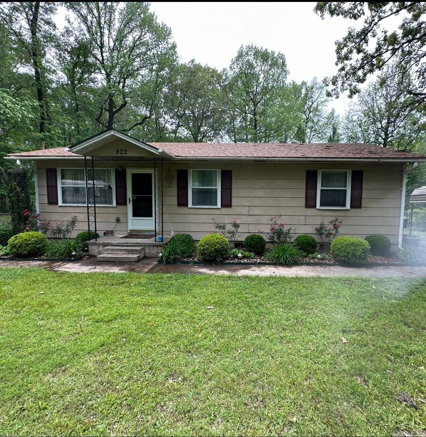 Check out this immaculate 3 bedroom home in Pine Bluff with 3 lots! Completely fenced backyard and roof is only 5 years old! This home is beautifully landscaped and has 2 storage sheds with electricity in the backyard! Washer and dryer stay with the home! This solid, well built home, offers all window treatments, carport, double insulated windows, ceiling fans, central heating and air, birch custom cabinets in the kitchen and a laundry room! All of the existing alarm system equipment conveys with the home as well! New hot water heater is only 2 years old! The attic is floored for all your storage needs! This home features gutters, outside motion lights, and a whole house surge protector! This well maintained home is one of a kind and you can enjoy the peaceful backyard from the back patio! Call me to set up your showing today!