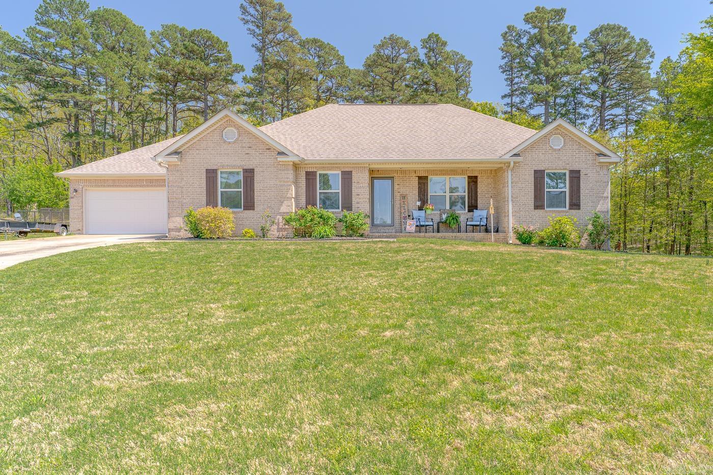 Welcome to Market 310 County Road 7890, Jonesboro, AR in the Brookland School District. This 3-bedroom, 2-bath home with a bonus room and partially floored attic offers 1,781 SF of living space on approximately one acre of land. This home offers all-electric living, with recently installed luxury vinyl flooring in the common areas and plush carpet in the bedrooms. The primary suite features a safe room located in the closet for additional peace of mind. The current owners favorites about the property include a spacious pantry, large closets, a practical mud room, and a 16x20 screened deckāperfect for relaxing evenings watching sunsets and local wildlife, including deer. The backyard is enclosed by a 5-foot black chain link fence that blends seamlessly into the natural scenery. Donāt miss the opportunity to enjoy a peaceful, country living lifestyle within a short distance to all your favorite amenities in Jonesboro, Brookland, and Paragould. Call to schedule your tour today!