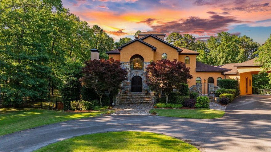 Welcome to this magnificent custom-built 7.76-acre estate nestled within an exclusive gated neighborhood in Chenal Downs, offering unparalleled luxury, style, quality, and privacy. A perfect connection to nature while being conveniently located near shopping, dining, and cultural attractions. This residence features stunning architectural details, exceptional craftsmanship, and premium materials that elevate every aspect of modern living. It boasts a meticulously designed floor plan featuring high-end finishes throughout: spacious living areas, ensuite baths with every bedroom, gourmet kitchen, elegant dining rooms, grand home theater, workout room and amazing outdoor living space complete with patio, swimming pool/hot tub, and outdoor kitchen. The home also features multiple iron doors, 5 fireplaces, 4-car garage, and 3 patios. This remarkable home presents a unique opportunity for buyers seeking luxury features without the high cost associated with custom new constructions. Recent upgrades include: roof 2025, interior paint 2025, standby generator 2024, pool pump 2024, pool heater 2023, EV charger 2022, Sunbrella canopy 2021, gas logs, sealed crawlspace 2018. See agent remarks.