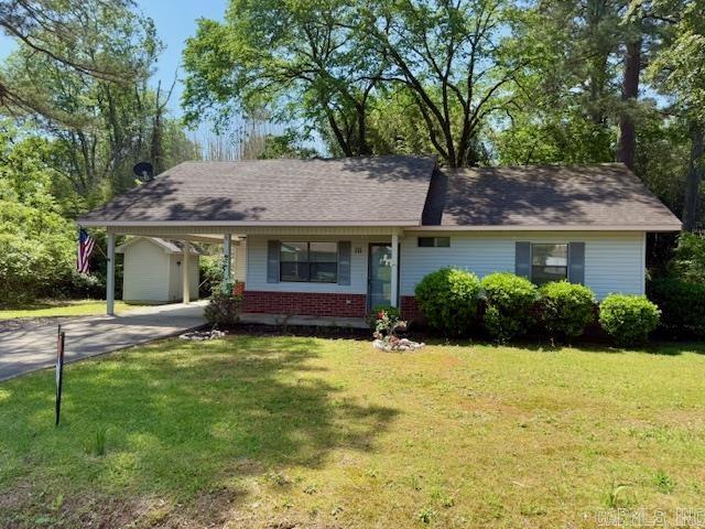 Charming 2-bedroom, 2-bathroom home featuring an open kitchen, living, and dining area with vaulted ceilings. This all-electric property boasts an architectural shingle roof installed in 2011. A spacious utility room and a storage building, all set in a low-maintenance yard with in a peaceful neighborhood. Enjoy the convenience of this home being close to everything and Perfect for comfortable living!
