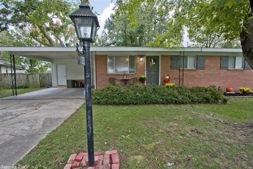 Charming home w/3 BR, 2 BA +a sep office/laundry rm. New 1.5 ton HVAC & thermostat. Large eat-in kitchen w/tile floors; slab granite c-tops, & stained antiqued cabinets. Nice Fr doors lead to patio, fenced yard & storage bldg. Bedrms & liv area have hardwd floors, new int paint, ceiling fans, & all new doorknob hardware. Master shower remodeled. 2 car carport could easily be converted to garage. Roof approx 6 y/o.  Levelized billing-electric $100, water $65, Gas $65 averages. SF Approx-encourage measuring.