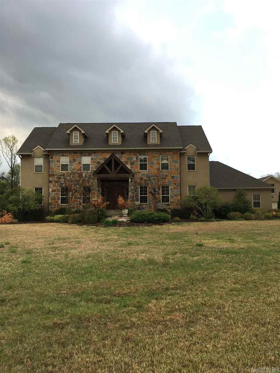 Spectacular 4 bedroom home 4 bath home on almost 5 acres with pool, hot tub and fully heated and cooled guest house.  Beautifully decorated, this house has a media room, office, a huge master bedroom suite, hardwood floors and open kitchen/ family combo. With unbelievable unobstructed views of Pinnacle Mountain this house is a must see!!