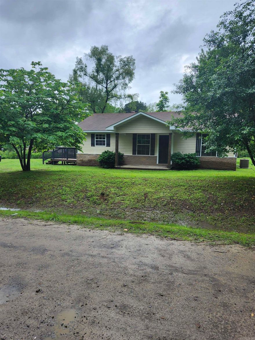 Almost New! The house is ready to go!! New paint throughout! Lovely curb appeal-covered porch, entertaining deck, large storage shed. Very spacious yard. It has it all!! Vacant! Text agent for showings.