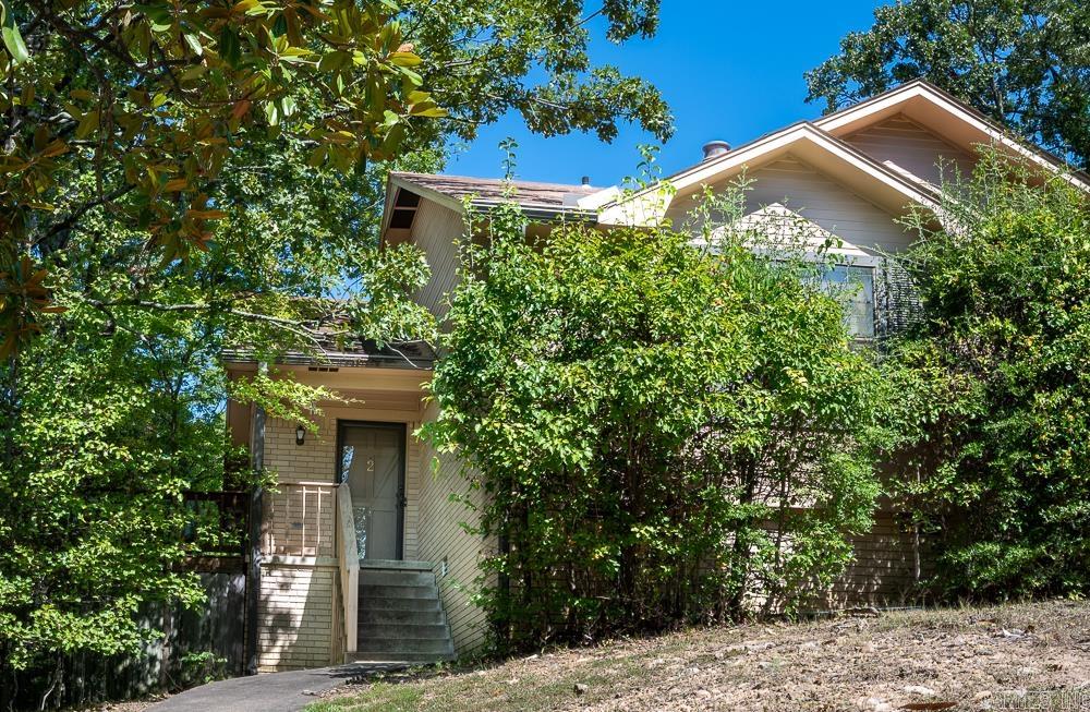 Great home on a quiet street with a cozy floorplan. Two spacious bedrooms - both with walk in closets and two full baths which bookend a large, open greatroom and kitchen. Greatroom with vaulted ceiling and WBFP - gas logs present. Kitchen with gas range and breakfast bar. Perfect for roommates. Large deck off kitchen area is elevated and tree shaded - so inviting! Separate laundry alcove off kitchen. Seller never lived in the home. This is an inherited property - no disclosure available. Home SOLD "as is" in present condition.