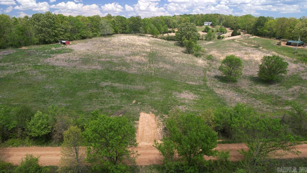 With power, water, and a new driveway into this unrestricted lot, you get to enjoy the freedom of the country without sacrificing modern conveniences. -No Restrictions! -New Driveway -Power & Water available Along Road Frontage -Very Buildable: No Floodplain, Cleared -New Survey -Partially Fenced -Priced Well Below Market