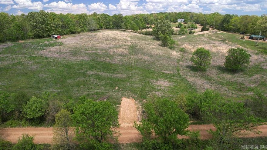 With power, water, and a new driveway into this unrestricted lot, you get to enjoy the freedom of the country without sacrificing modern conveniences.  -No Restrictions! -New Driveway -Power & Water available Along Road Frontage -Very Buildable: No Floodplain, Cleared -New Survey -Partially Fenced -Priced Well Below Market