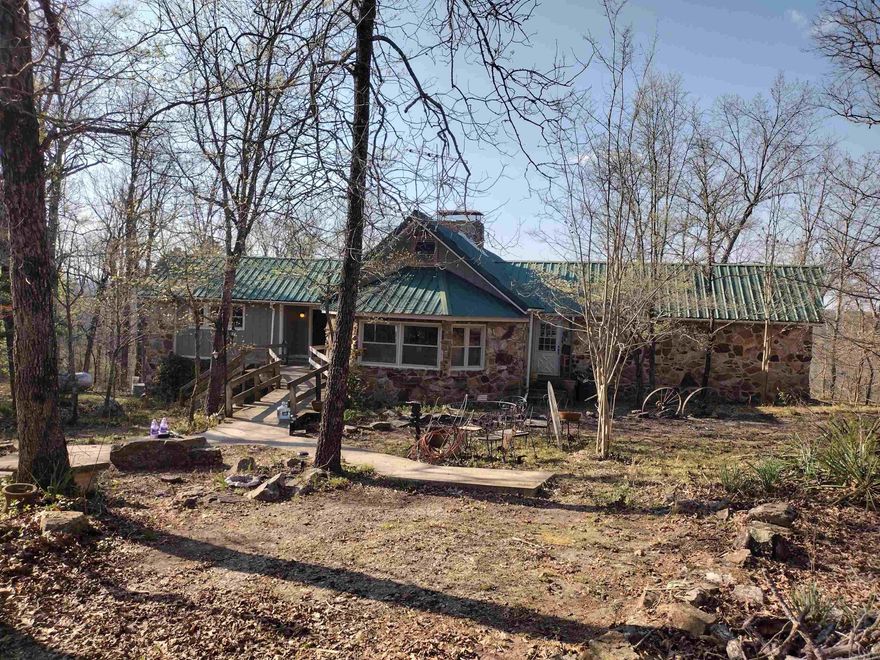 One-of-a-kind property offering 194 acres M/L with incredible views of the White River, surrounding mountains and open field this property features a house, 4 finished cabins, 1 ready to be finished all offering the own special view and a maintenance building with living quarters, providing multiple opportunities for residential, recreational, and income producing. this land has Ozark National Forest on 3 sides with White River frontage on the other for supreme private retreat. Property includes a rare and attractive balancing rock formation that would be great to add a wedding venue. With existing improvements this property is well-suited for short-term rentals, retreat-style lodging, for a hunting and fishing lodge to do guided trips also plenty of room to add more cabins to make even better retreat, boat ramp just minutes down the road. This is a rare opportunity to own this special property with unlimited potential. Photos do not adequately capture the beaty and uniqueness this is a must-see property I have lots more photos that can be sent at request.