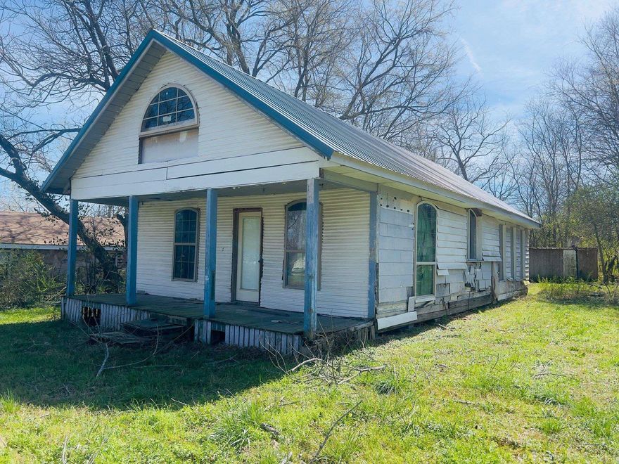 Blank Slate- Home has been gutted waiting for a new owner to make it their own. Metal roof 6-7 yrs old, updated arched windows, per seller updated electrical panel installed by Aleshire Electric.