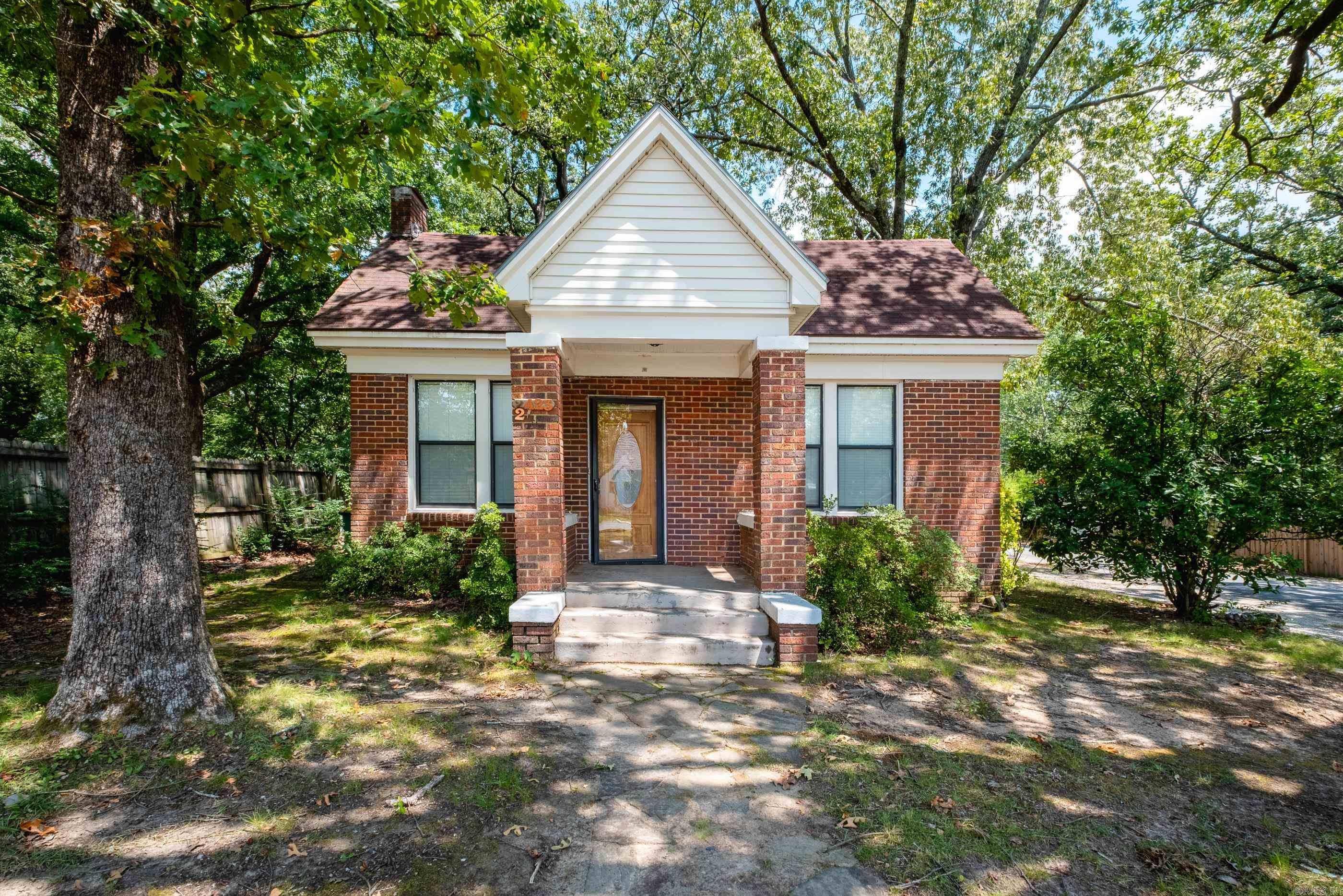 This bungalow just might be for you! Original hardwood flooring, three bedrooms and 2 full baths, large laundry room, cute front porch and deck in back. There is also a permanent storage building in the back yard. The tall ceilings make the home feel large. The third bedroom, second bath and laundry room were added at some point. This property is ready for a tenant or for a owner that wants to provide some love and make it their own! Lots of remodeling going on in the area!