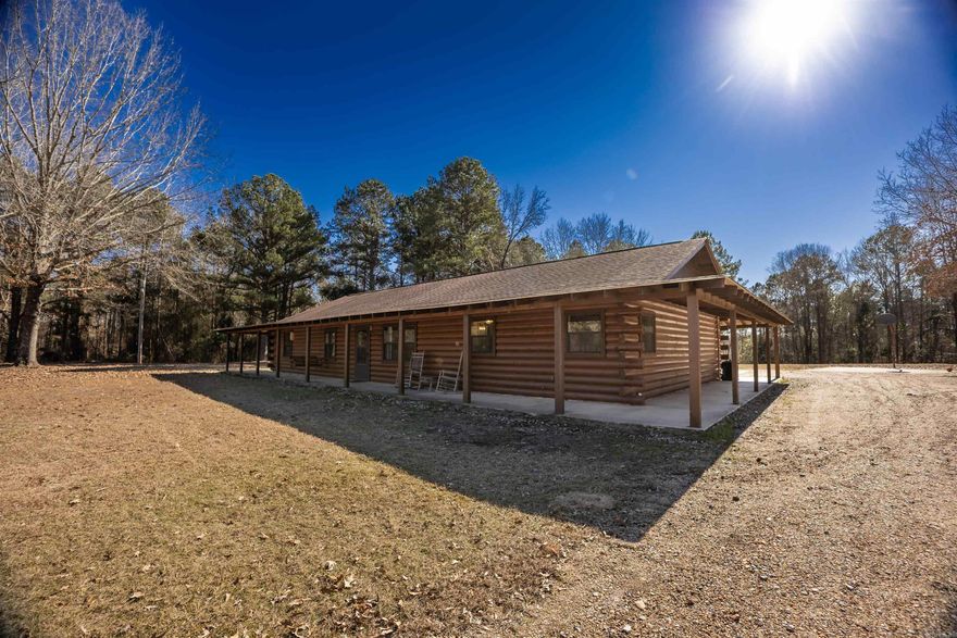 Welcome to 191 Charlie Vance Road!  This three-bedroom, two-bath home features an extra room that could be used as a playroom, spacious office, or even made into a private primary suite. It sits on 4 acres with beautiful privacy, yet you're just minutes from town and Mystic Creek Golf Course.  It's so private and cozy-- the perfect blend of comfort and convenience.