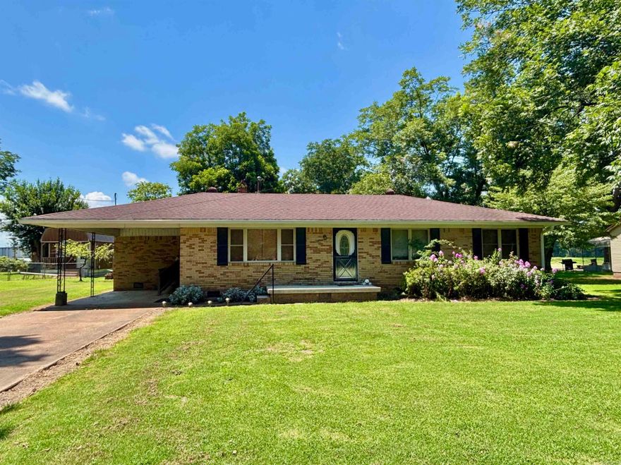 Welcome to 202 Free Street! This 3-bedroom, 1-bath home offers approximately 1,460 square feet of comfortable living space on a large lot. Located in Portia, this property blends country living and small-town charm with everyday convenience, being only a short drive to shopping and health facilities. Inside, you'll find a spacious layout that's move-in ready with room to add your personal touch—featuring a brand-new walk-in shower, wall heaters for backup heat in the winter, and a large laundry/mudroom that walks out to the carport. There’s also a flue available to install a wood or pellet-burning fireplace, perfect for cozy evenings. The yard offers plenty of room for gardening, play, or future expansion and is accented by mature fruit and pecan trees. You'll also enjoy a well-maintained storm cellar for added safety, a shop with a lean-to, a storage shed, and an additional well ideal for watering your garden. The home boasts a new water heater, newer roof, newer HVAC system, newer windows, along with other great updates! Don’t miss the chance to make this Portia home your own!