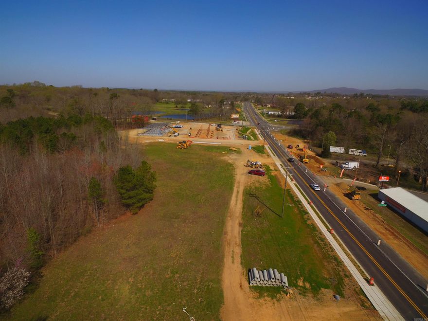ONE OF THE LAST LARGE TRACTS OF LAND ON CENTRAL AVE.---THIS 27.71+/-ACRES HAS 1622 FEET +/- OF ROADFRONTAGE AND AMPLE SPACE FOR A LARGE MALL, HOSPITAL COMPLEX, BUSINESS COMPLEX, CASINO OF THE FUTURE,OR DEVELOPMENT THAT NEEDS SPACE AND VISIBILITY. LARGE VOLUME CAR COUNT PASS BY EACH DAY. THISPROPERTY IS CENTRALLY LOCATED AND LAYS RELATIVELY LEVEL WITH A FEW SMALL ROLLING HILLS WITH MOUNTRIANTE IN THE BACK GROUND. LAND CAN BE PURCHASED IN SMALLER TRACTS--3 ACRES, 8 ACRES, OR 15 ACRES--(ALLMOL) CALL AGENT FOR MORE DETAILS-- I- 30 A SHORT DISTANCE AWAY -- OWNER IS A LICENSED ARKANSAS REALESTATE BROKER-