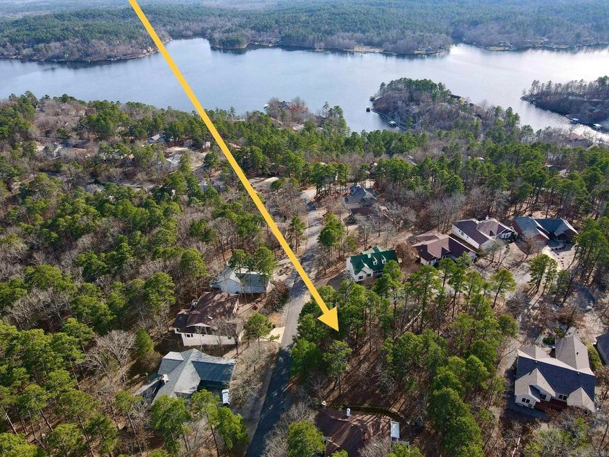 Nice level lot on corner of Hanares Lane and Coronado Lane. Flat and easy to build on. Save some money on construction costs with a slab. Great neighborhood to walk around and see some views of Lake Coronado. New Member Buy-in Fee due at closing.