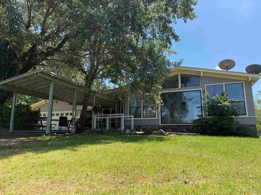 This gem would make a great starter home or to downsize in the heart of Greers Ferry. Just needing your special touch to make it yours. Between the garage and storage shed plenty of room for some toys or yard tool's. Sun room with plenty of natural light. Large primary bedroom with bathroom. Don't hesitate to take a look. Agents see remarks.