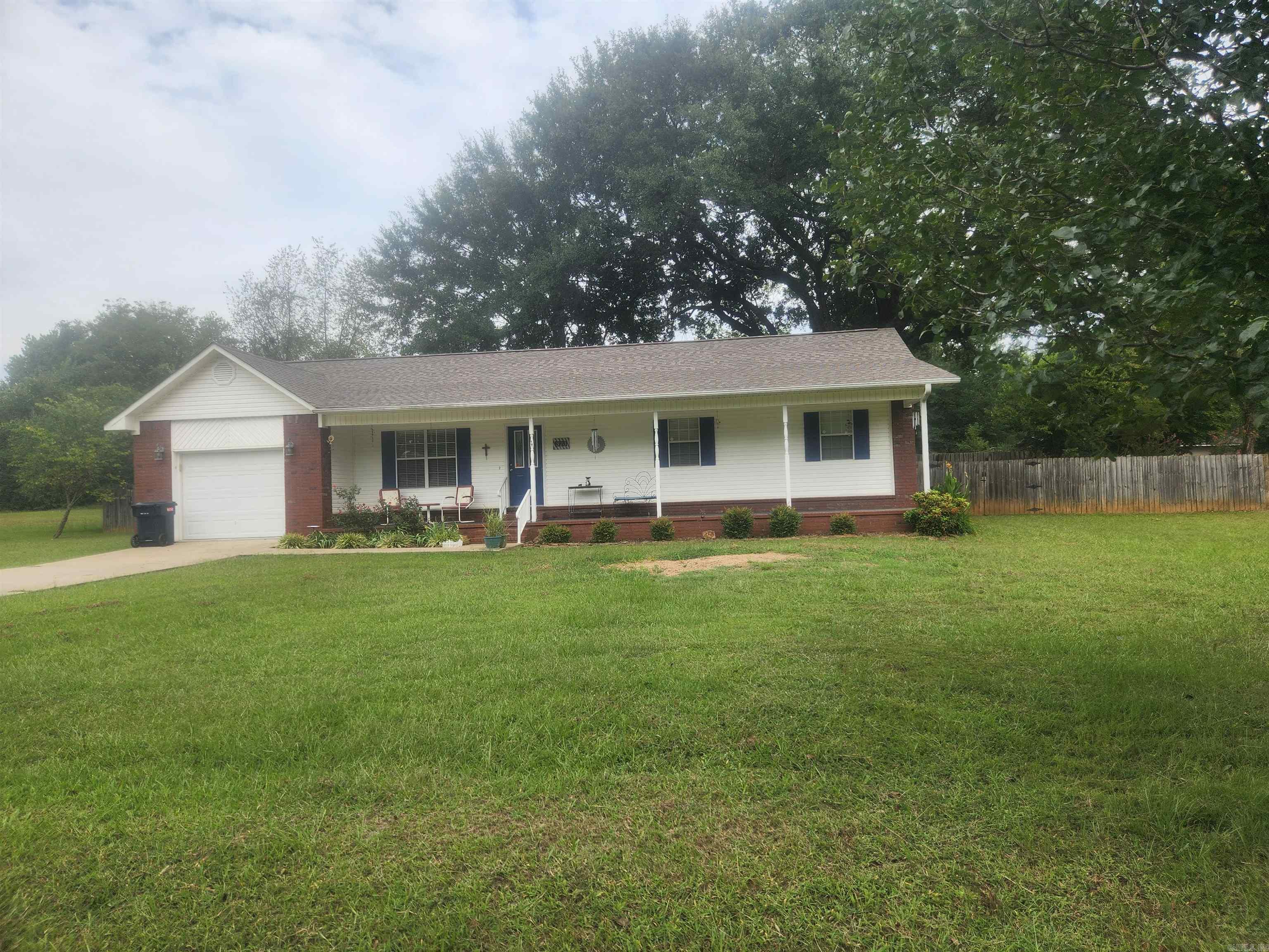 Perfectly maintained 3bd, 2ba, Brick and vinyl home in much desired Lamar School District. Large family room with great natural lighting. Nice kitchen with lots of storage, very large laundry room with extra cabinet space. Big full front porch, back deck looking on big privacy fenced back yard with huge trees. Make this perfect for a family home! Home build 2005. New heat and air in May of 2024, new roof in 2022, concrete driveway, and more! This one is ready for its new family.