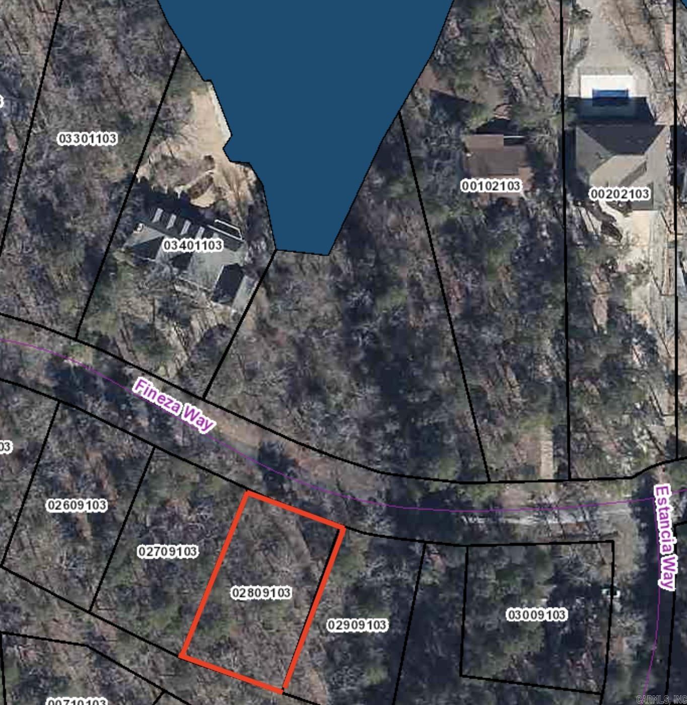 This wooded lot has a view of Lake Coronado. Across from the lot is common areas, giving near level access to the lake front (docking structures would not be allowed). Great neighborhood offering views and privacy.