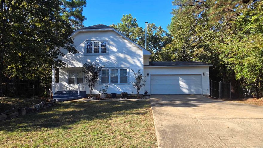 Welcome to this beautifully maintained 4-bedroom, 3 full bath home offering space, comfort, and functionality throughout. You'll love the oversized bedrooms, each with generous closet space. The heart of the home is a huge kitchen, ideal for entertaining or everyday living. Outside you will enjoy the massive deck complete with a built-in bench, perfect for hosting or enjoying a quiet evening outdoors. The fully fenced backyard offers privacy and peace, creating your own personal retreat. The home also features a freshly updated downstairs bathroom with a new tile surround, adding a modern touch. With its thoughtful layout, large living spaces, and serene outdoor area, this home truly has it all. Don’t miss this opportunity to own a spacious, move-in-ready home in a peaceful setting! Agents see remarks concerning potential VA assumption.