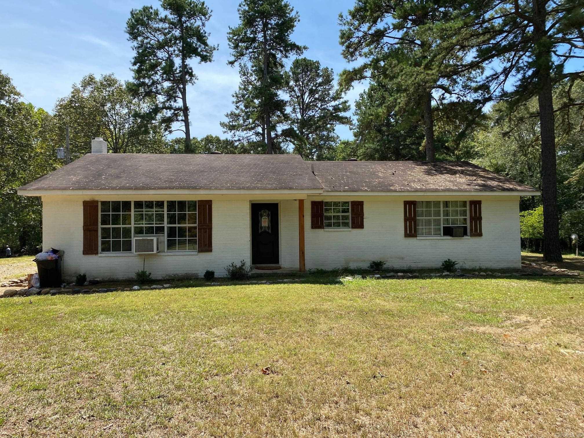 This cute remodeled 3 bedroom, 2 bathroom house is located on 4 acres in Hatfield, Arkansas. This property is great for a primary residence or as it is currently, a short term rental property. There is a large back room that would be perfect for a den, a game room, or transform it into a bedroom with a closet that is so big, it is currently being used as a bunk room! The beautiful kitchen is furnished with a large refrigerator, farmhouse sink, gorgeous wood counter tops, and a glass top stove, perfect for cooking those amazing meals. Enjoy those meals in the dining area off of the kitchen or on the back patio. This property is too good to pass up!
