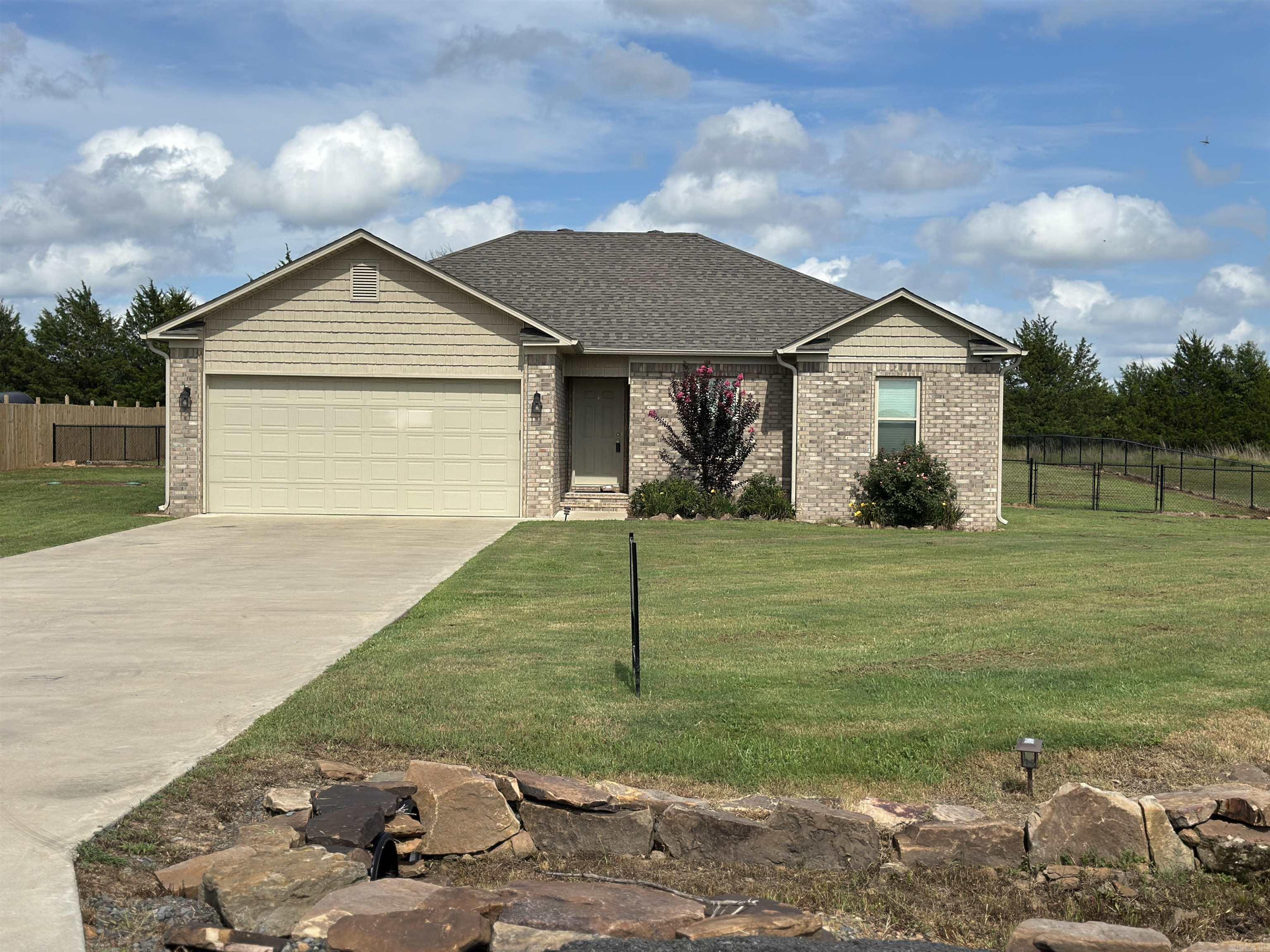 Exceptional opportunity to own a 3 bedroom, 2 bathroom home in Quitman, AR. Constructed in 2022, this property boasts an open living, dining and kitchen area, ample counter and cabinet space, and a spacious primary bedroom. Additional features are split floor plan, ceiling fans in all the bedrooms, a large fenced backyard, and access to Petit Jean fiber internet. Schedule a showing today, as this property won't last long.