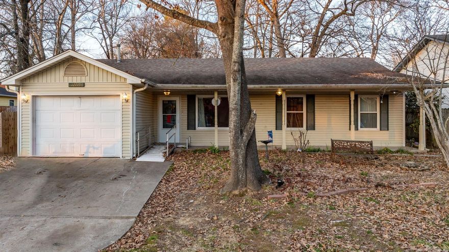 This adorable house is ready for new owners! Perfect for someone looking to add their own sweat equity or would be a great rental. There is a nice sized eat in kitchen and a beautiful fireplace in the large living room. The hardwood floors are original and would be gorgeous once refinished. The primary bathroom is handicap accessible. Come see it today!