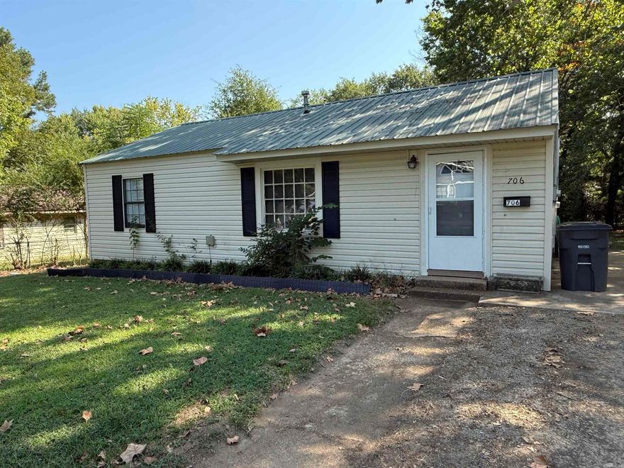 Welcome to this cozy 2-bedroom, 1-bath home featuring a spacious walk-out deck perfect for relaxing or entertaining. Enjoy easy upkeep with no carpet throughout—ideal for those seeking a clean, allergy-friendly space. This home offers a comfortable layout, natural light, and a peaceful setting both inside and out.  Perfect for small families, couples, or individuals looking for a move-in ready home with character and convenience.