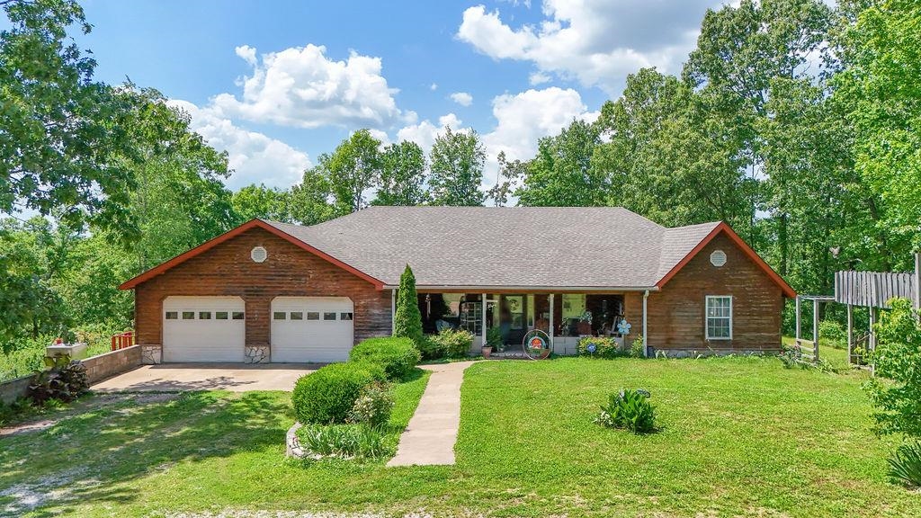 Embrace the comfort of country living in this 3,784 sq foot home on 6 surveyed acres in Charlotte, AR. Features include a new roof, 800 sq ft family room, 2 heat pumps, Central HVAC electric, outdoor wood furnace, 2 fireplaces, screened porch, open deck, fenced backyard, and fruit bearing peach, plum, and pear and apple trees. Includes goat barn/pen, feed/chicken barn/pen, small catch pen, raised bed garden fully planted, and open pasture. Quiet country living at it's best. Just a short drive to the popular White River and Black river. Perfect for rural living.